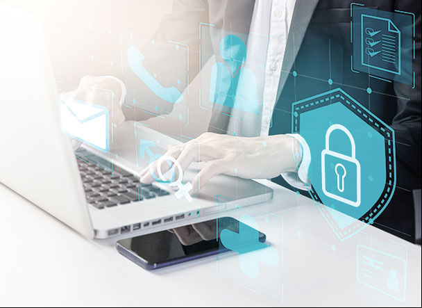 A person typing on a laptop. In the image, information security and technology symbols are graphically represented